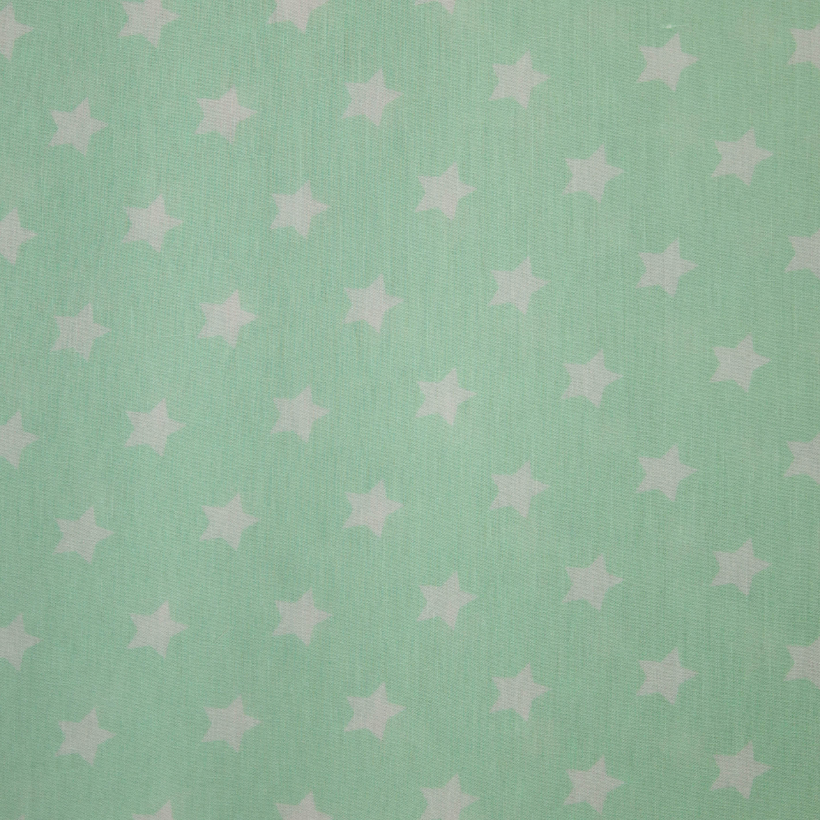 Katoen licht appelblauwzeegroen met kleine witte sterren